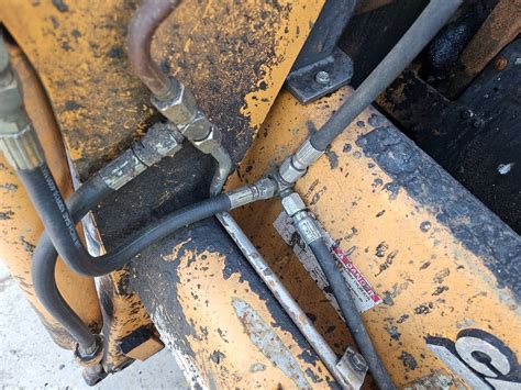 case skid steer bleeding drive lines|case 1840 hydraulic drain problems.